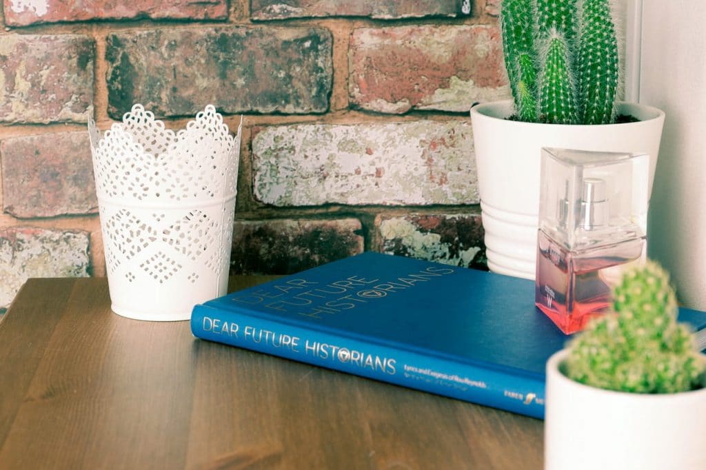 perfume on the top of the book