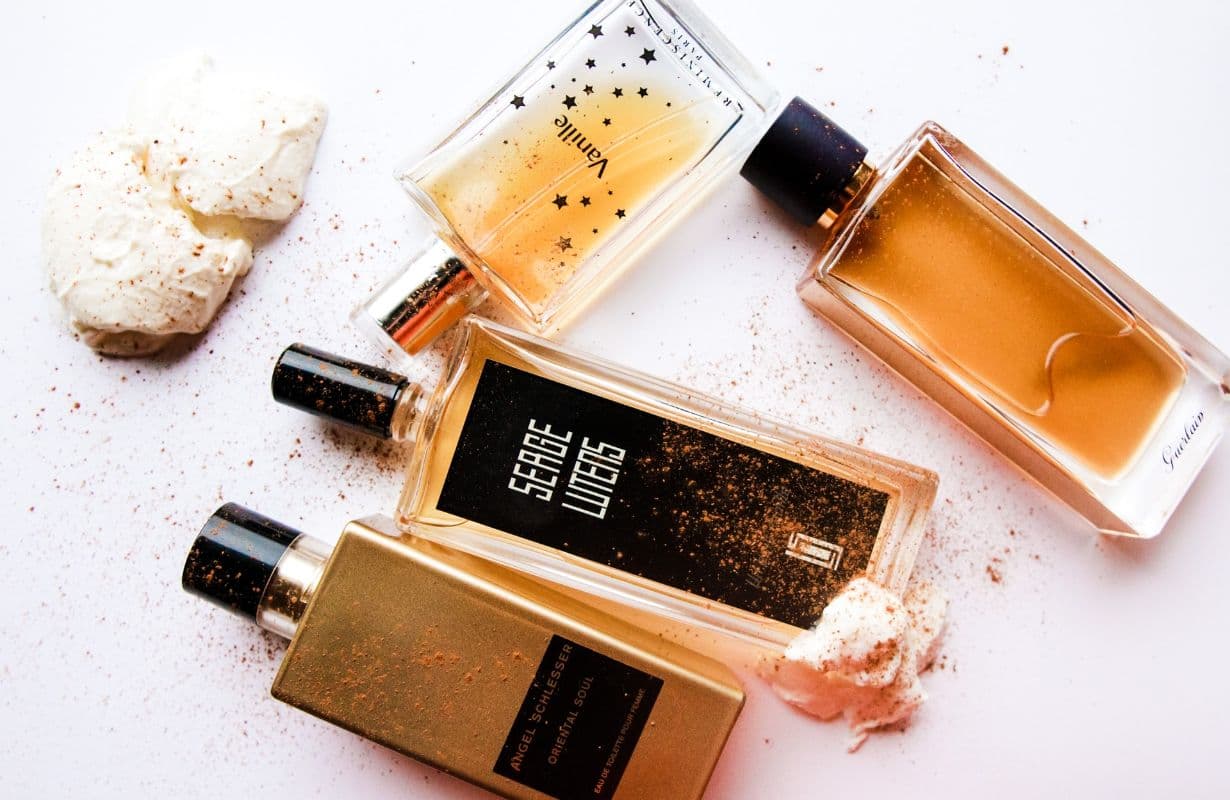 four perfume bottles - hyped fragrances
