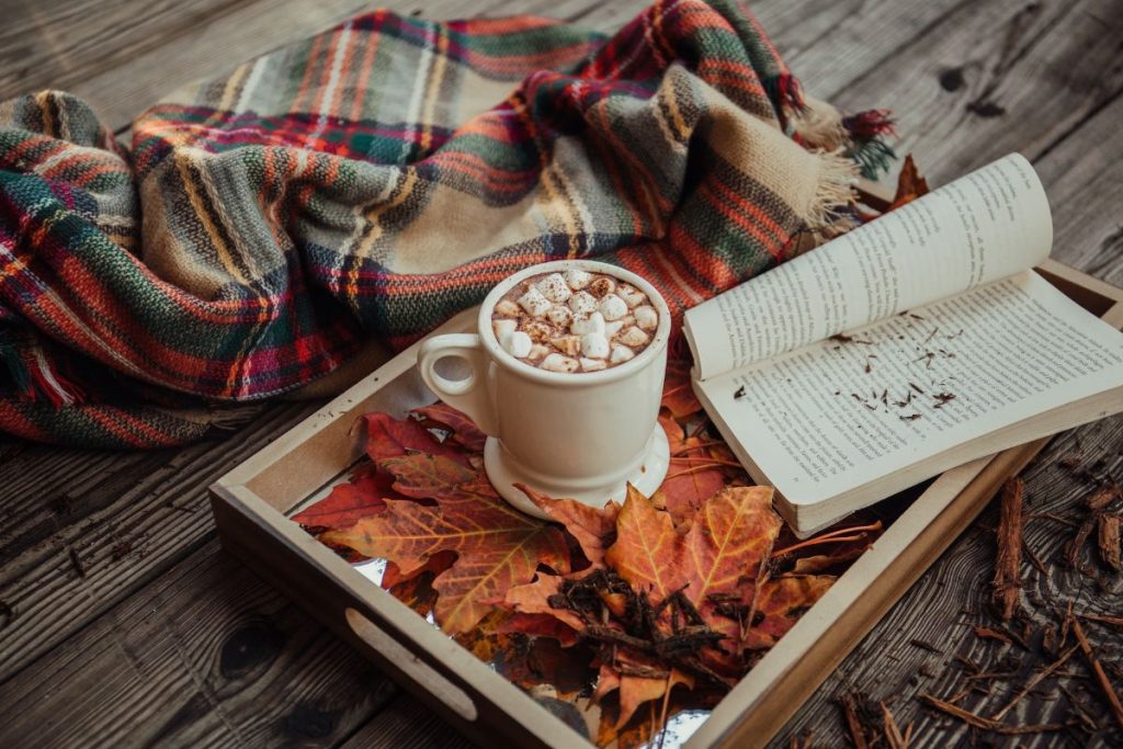 Cheap Fall Fragrances - mug of coffee and a book